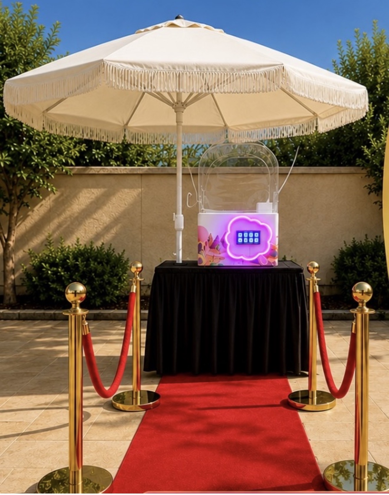 Cotton candy machine VIP setup with red carpet